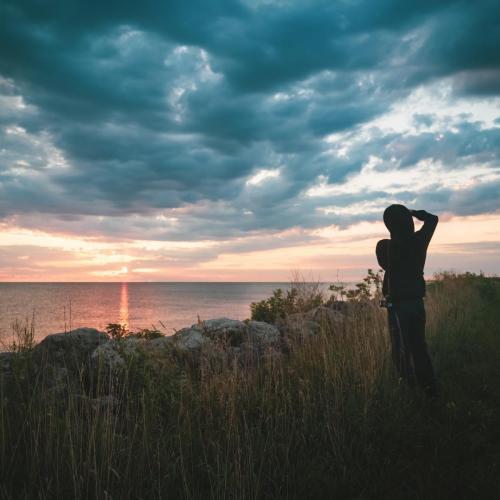 A Photographer Capturing The Sunrise